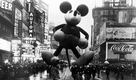 A true original. Mickey Mouse was the first character balloon to appear in Macy's Thanksgiving Day Parade. This photo dates to the 1920s/30s. Web image.
